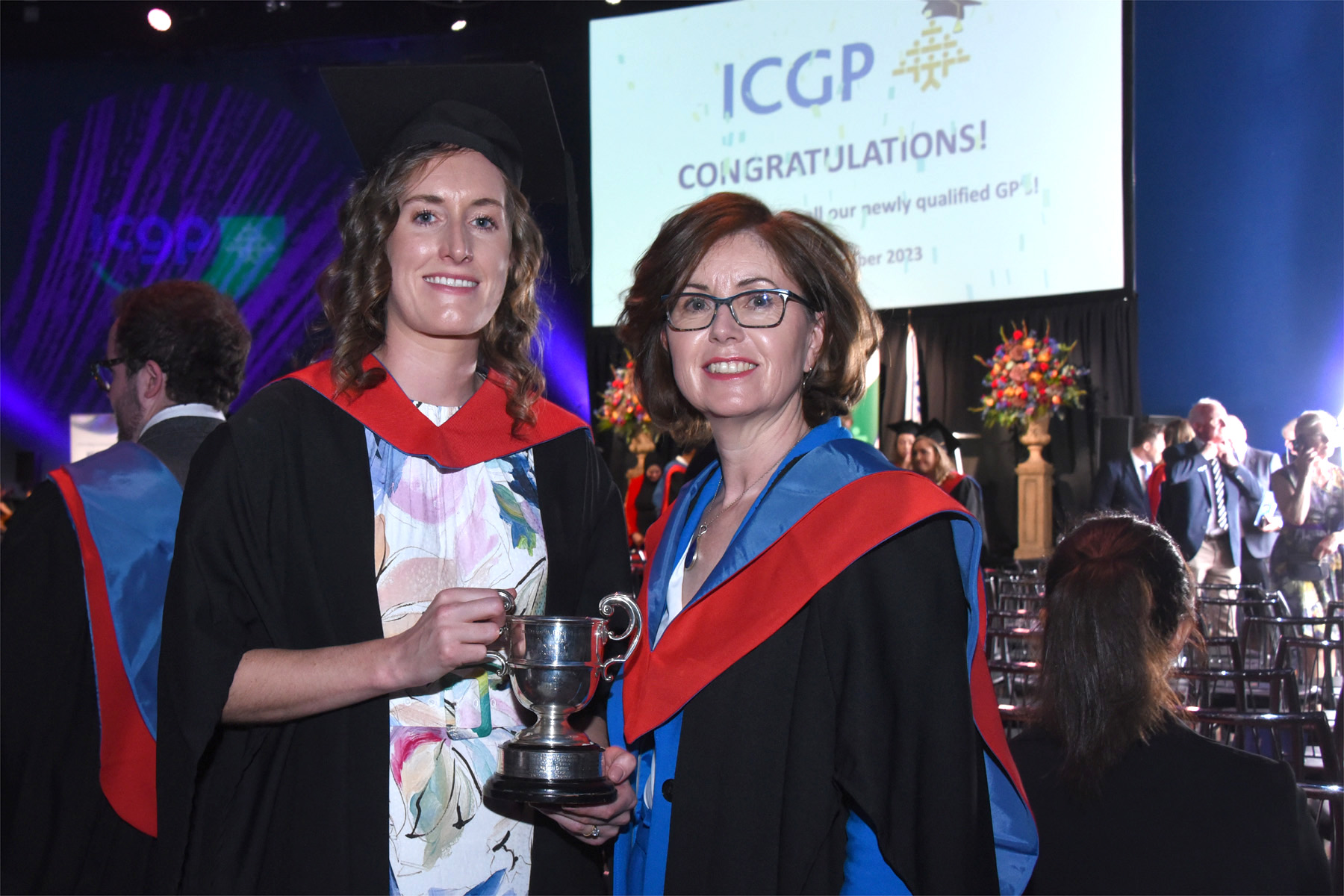 Graduate and Chairperson at Graduation Ceremony